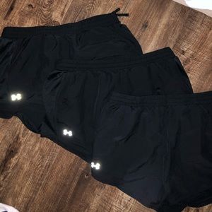 3 pairs of identical black under armor shorts!